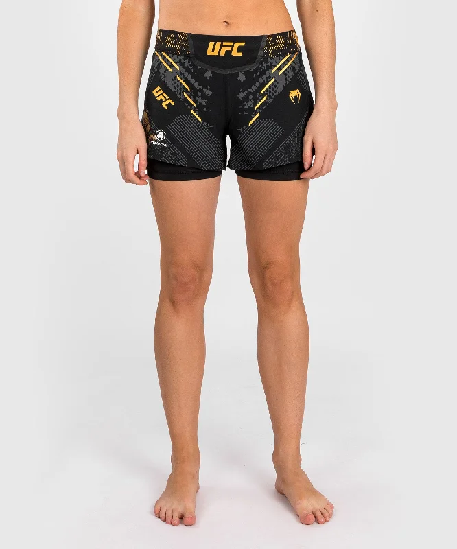 Stock Up and Save UFC Adrenaline by Venum Authentic Fight Night Women’s Fight Short - Champion Stock Up and Save UFC Adrenaline by Venum Authentic Fight Night Women’s Fight Short - Champion